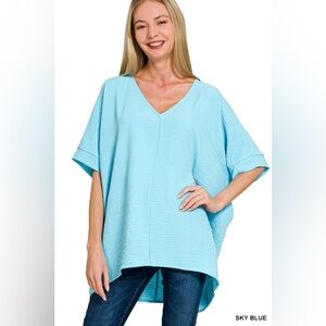 Zenana Sky Blue Woven Airflow V-neck Dolman Short Sleeve Top